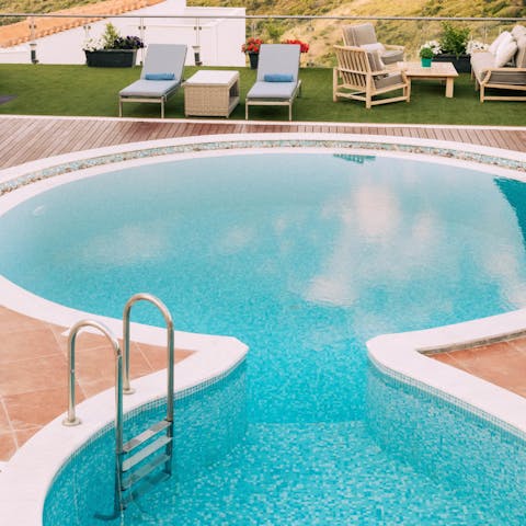 Glide across the circular pool in complete privacy