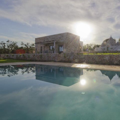 Swim lengths of your private, outdoor pool while enjoying being surrounded by olive and fruit trees