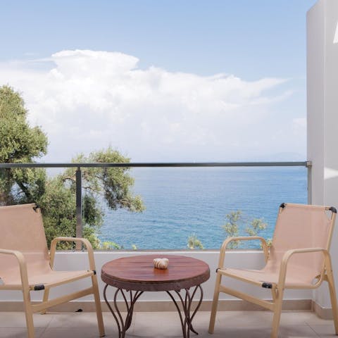 Wake up to sweeping views of the Ionian Sea from the bedroom balcony