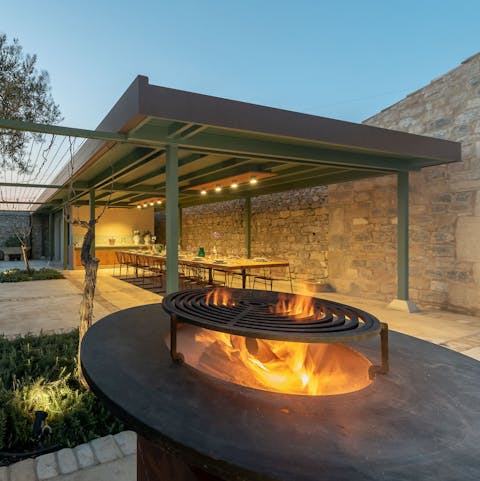 Gather around the fire pit on the terrace when nighttime descends