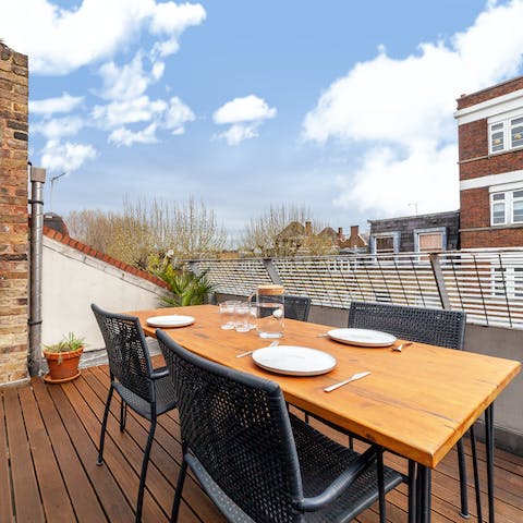 Share alfresco meals on the roof terrace on sunny days