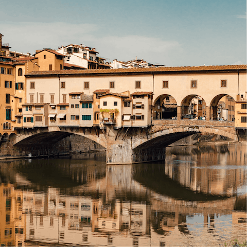 Take an inspiring stroll across nearby Ponte Vecchio bridge