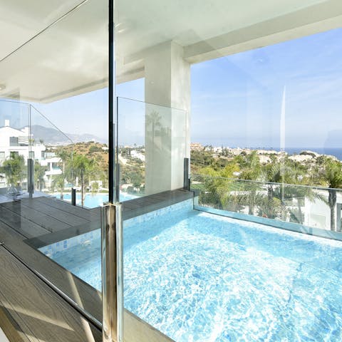 Admire the views while relaxing in the private pool