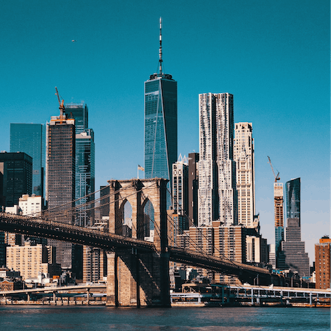 Take in the sights of the Brooklyn Bridge, just a seventeen-minute cab ride away
