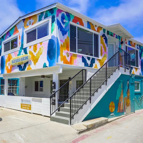 Stay in a quirky painted beach house with large windows