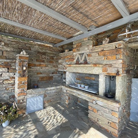 Rustle up a rustic lunch in the outdoor kitchen made of stone