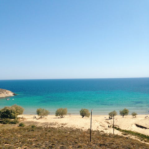Drive four minutes or walk twenty to Leftos Gialos beach 