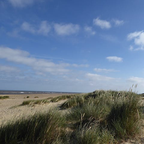 Stay steps from The Denes Beach