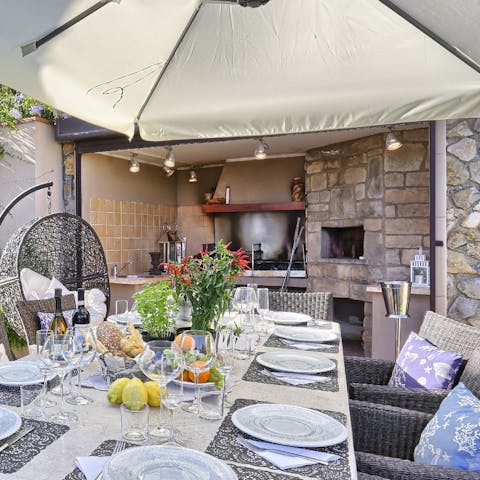 Stoke up the barbecue and get cooking in the excellent outdoor kitchen 