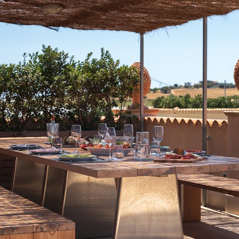 Serve up delicious pasta dishes paired with Italian wine under the pergola dining area 