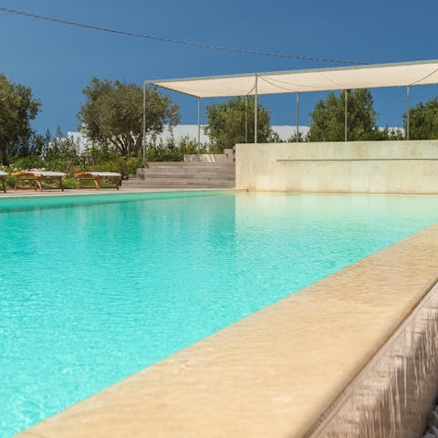 Cool off with a dip in the private swimming pool 