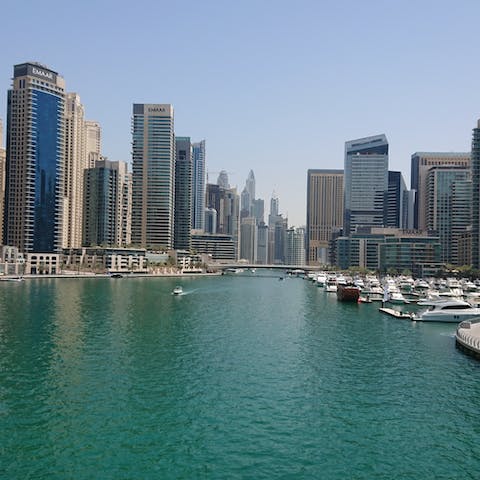 Explore Dubai Marina – a car ride away – for scenic ambles along its promenade and shopping at the Dubai Marina Mall