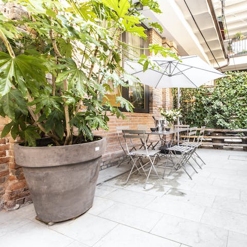 Relax amongst the lush greenery in the private courtyard