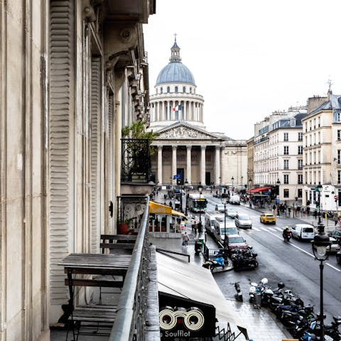 Perch by the living room's Juliet balconies – a glass of wine in hand – while taking in views of the Panthéon