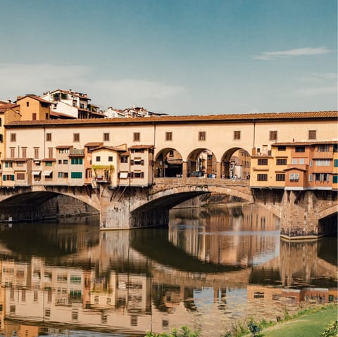 Admire the artisanal craftsmanship on Ponte Vecchio – just a ten-minute walk away