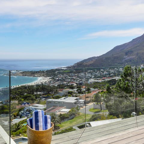 Enjoy ocean and mountain views from your vast private terrace