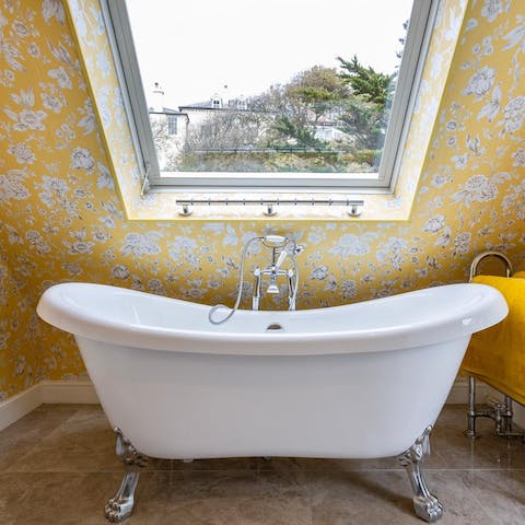 Soak in the romantic clawfoot bath tub