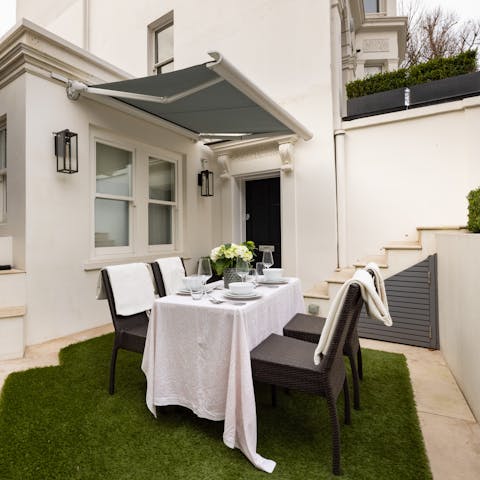 Sit down for group meals in the elegant garden dining area