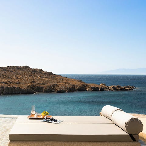 Be the king of your own lounging island in the infinity pool