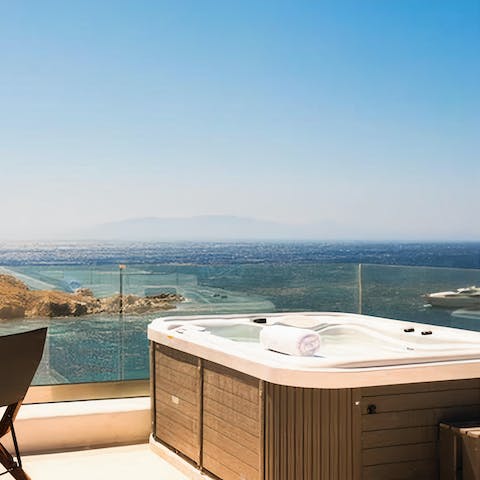 Head up to the hot tub with a fabulous sea view