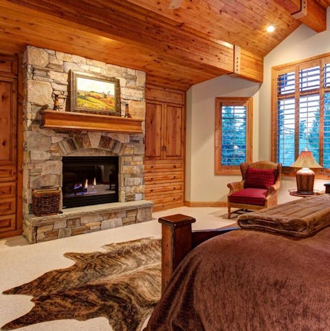 Snuggle up in front of the master fireplace at the end of an active day