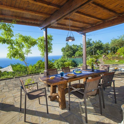 Admire the stunning sea views from the alfresco dining area 