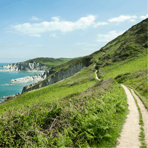 Explore Cornwall's scenic South West Coast Path, only a thirty-minute drive away