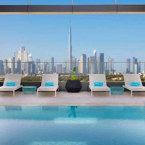Swim in the pool with an incredible view of the skyline
