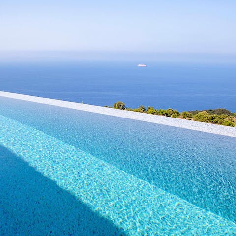 Watch the sky merge with the sea as you float about in your private pool