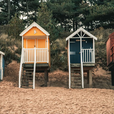 Check out the colourful beach huts at Wells-next-the-Sea,  just a twenty-minute drive away