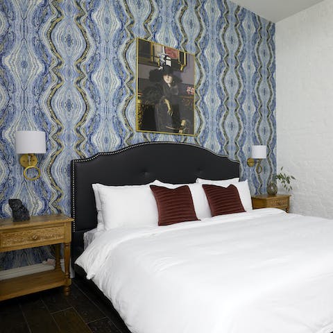 Embrace the jazzy nature of the city in the master bedroom