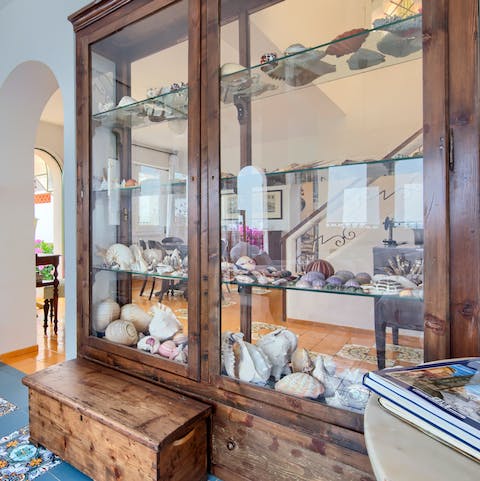 Check out the seashell collection in this charming home