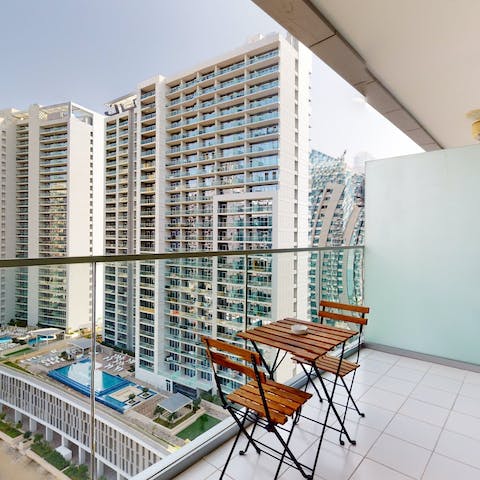 Soak up the city vistas from the private balcony with morning coffees