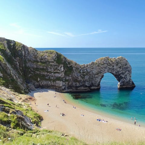 Marvel at Durdle Door, which is just over a thirty-five-minute drive from this home