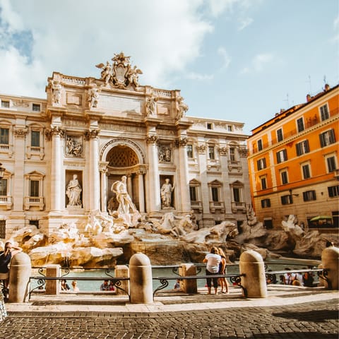 Begin your Roman Holiday at the Trevi Fountain