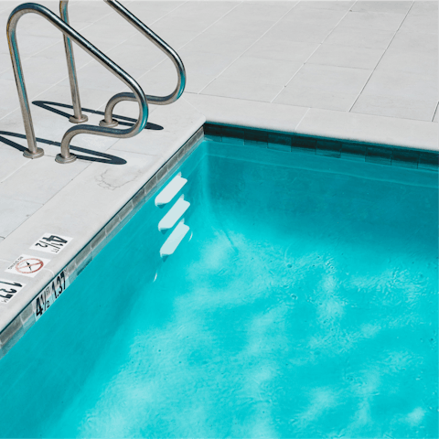 Cool off from the Dubai heat in the communal outdoor pool