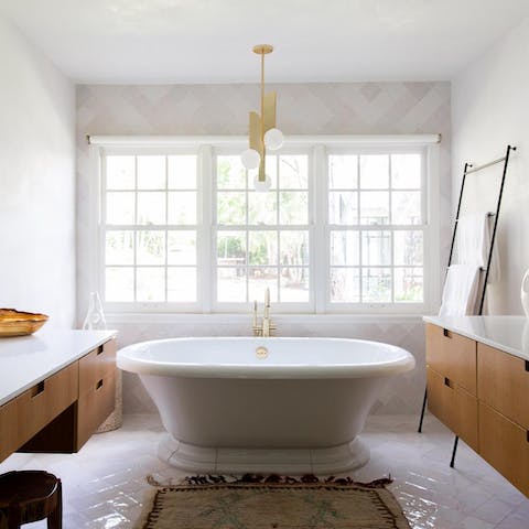 Relax and unwind with a soak in the freestanding bathtub in the ensuite master bathroom