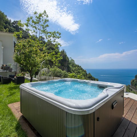 Soak up your surroundings from the bubbles of the hot tub