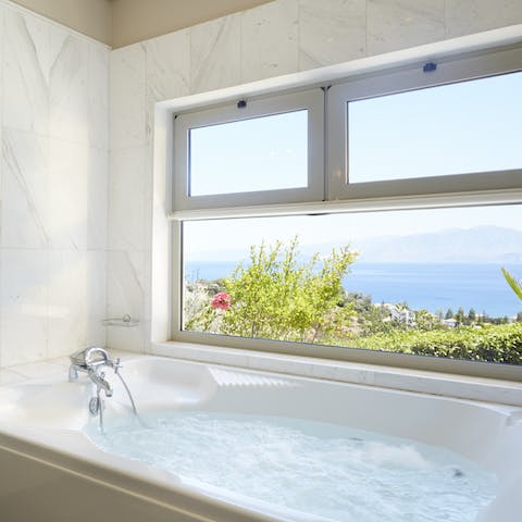 Soak in the tub with a side of sea panoramas!