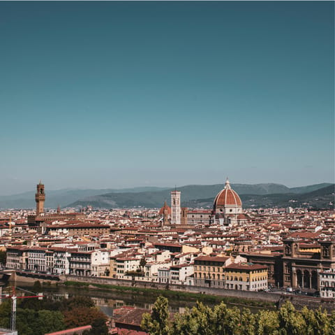 Admire views across Florence from Piazzale Michelangelo, sixteen minutes away on foot