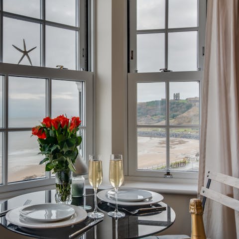 Enjoy a romantic meal by the bay window with views of Scarborough Castle in thee distance 