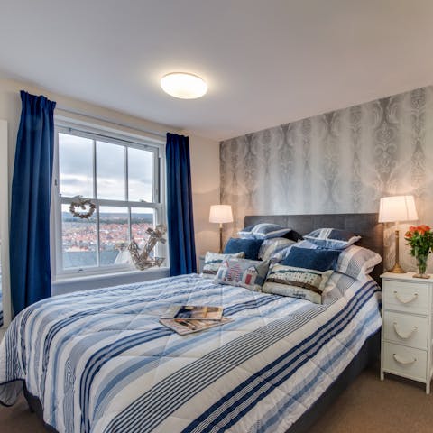 Wake up in your maritime-themed bedroom, feeling rested and ready for another day of sightseeing