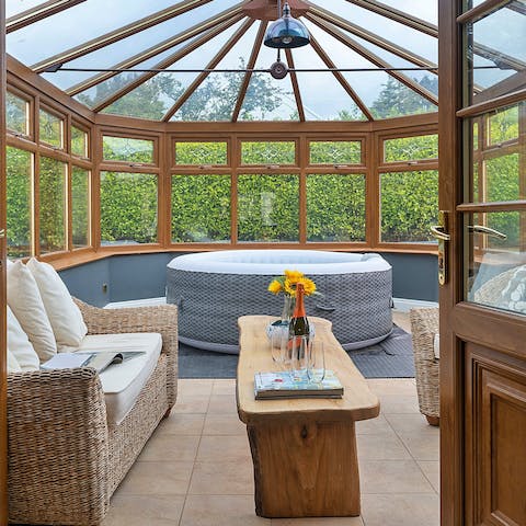 Feel a wonderful sense of relaxation while soaking in the hot tub