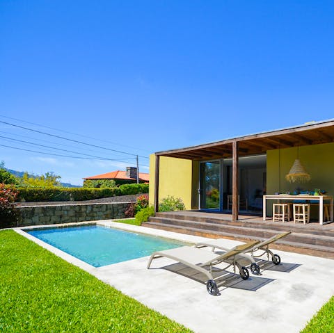 Laze on loungers beside the pool and top up your tan while enjoying countryside and even sea views