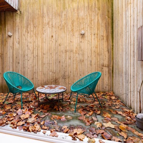 Take a seat on the Acapulco-style chairs in the private courtyard and enjoy a glass of fizz