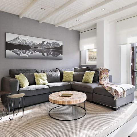 Warm up after a day of skiing in your bright, open-plan living area