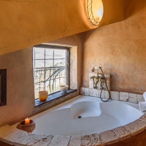 Sneak away for a long bubbly soak with a view