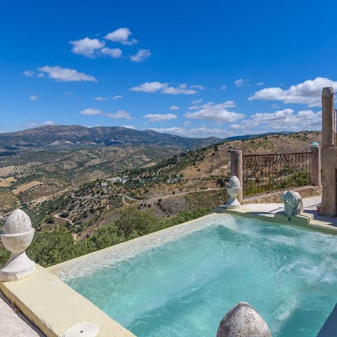 Soak up the mountain and sea vistas from your private infinity pool