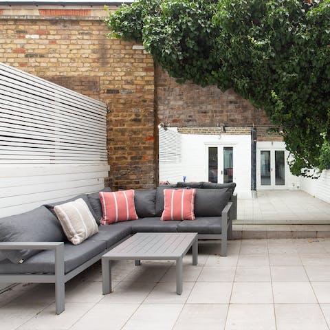 Enjoy cocktail hours in the garden, soaking up the evening sun