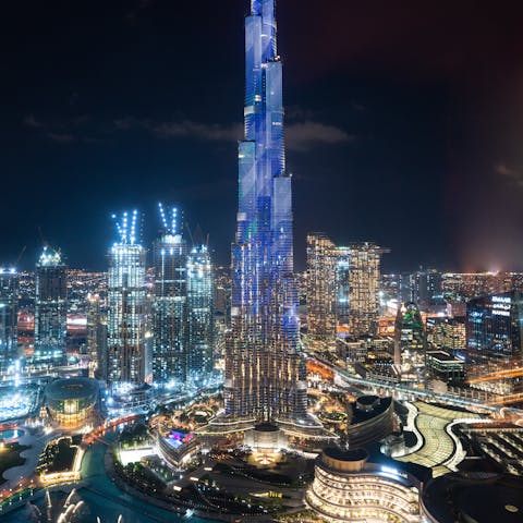 Explore Downtown Dubai's Mall, Burj Khalifa and Fountain at night, it's a short drive